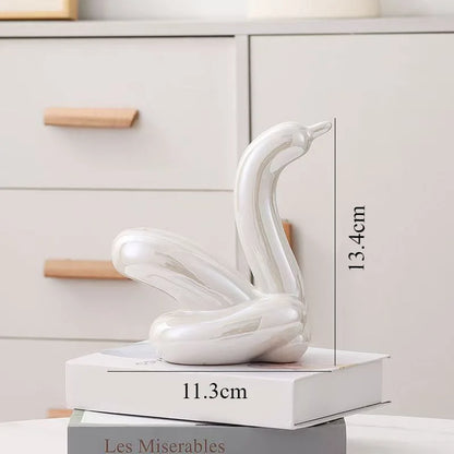 Ceramic swan sculpture, white glossy balloon style abstract ornament, 13.4 cm tall decor on Tampa Home & Garden Store