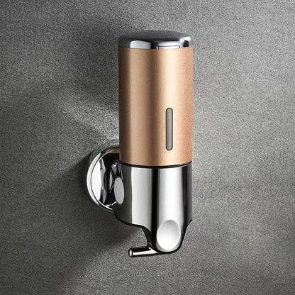 Wall mounted shampoo and soap dispenser with bronze-gold body and chrome accents on Tampa Home & Garden Store