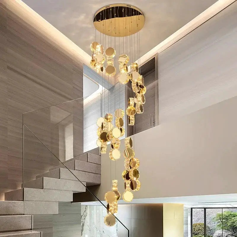 Decorbites LED pendant chandelier with cascading gold discs in a modern living-dining area on Tampa Home & Garden Store