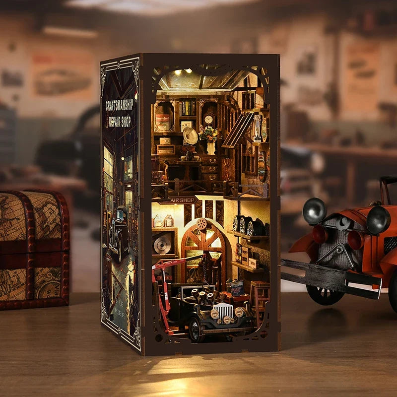 Perfecsy Master Mechanic Workshop miniature display in a dark wood cabinet with lit details on Tampa Home & Garden Store