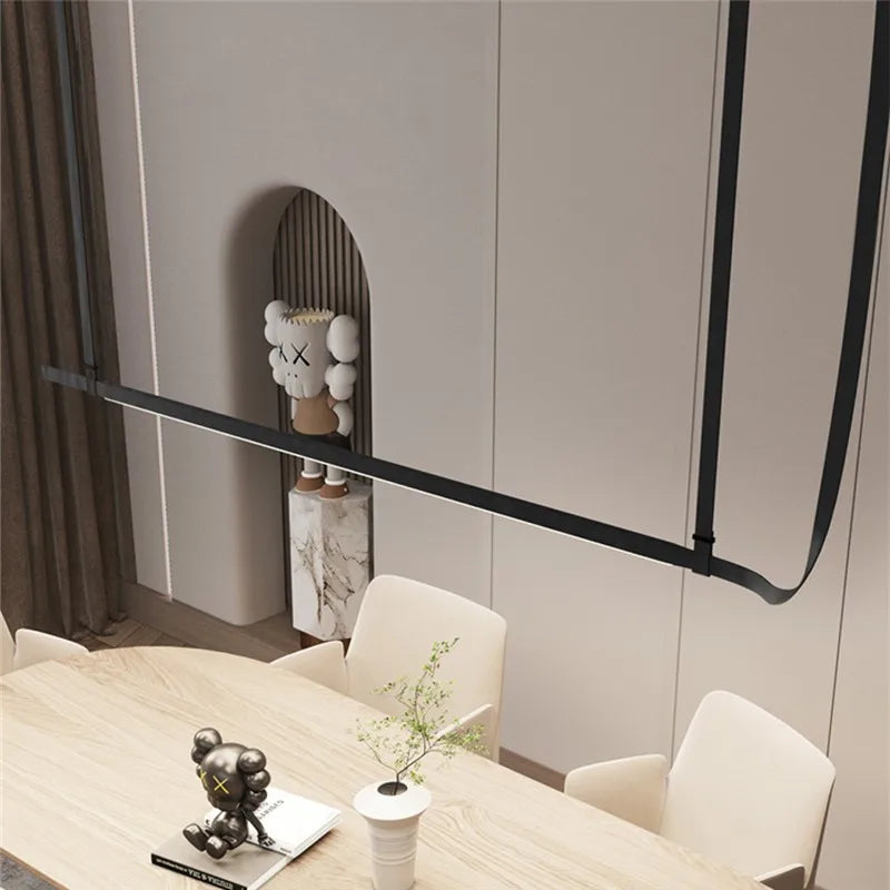 DecorBites LED Art Deco Chandelier, black linear dining light over wood table on Tampa Home & Garden Store