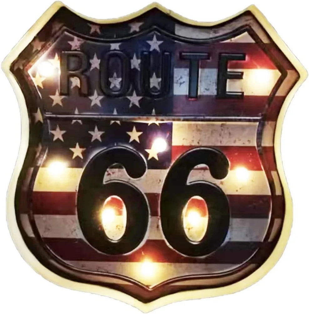 Route 66 shield tin sign with distressed American flag, glowing bulb accents, metal wall art on Tampa Home & Garden Store