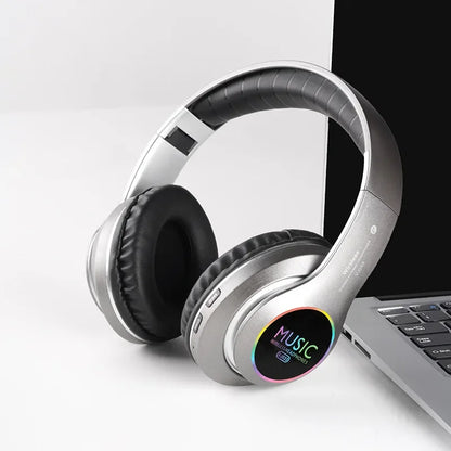 Wireless Bluetooth 5.0 on-ear headphones in silver with black cushions and rainbow logo on Tampa Home & Garden Store