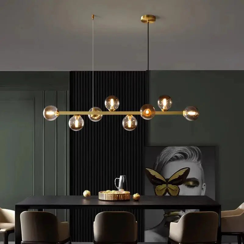 DecorBites LED pendant chandelier with gold bar and clear glass globes for modern dining on Tampa Home & Garden Store