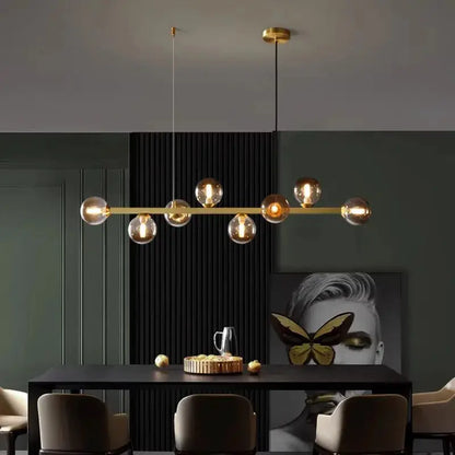DecorBites LED pendant chandelier with gold bar and clear glass globes for modern dining on Tampa Home & Garden Store