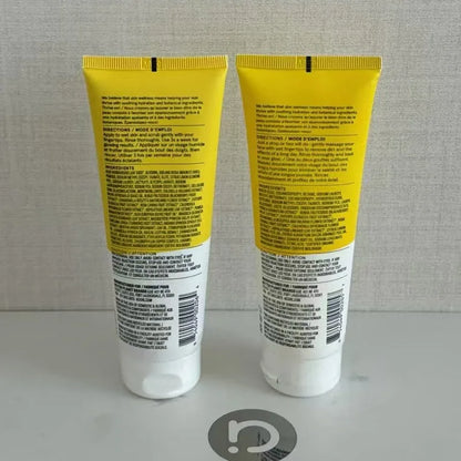 ACURE Exfoliating Blackheads Green Mud Seaweed Scrub facial cleansers, two yellow tubes on display on Tampa Home & Garden Store