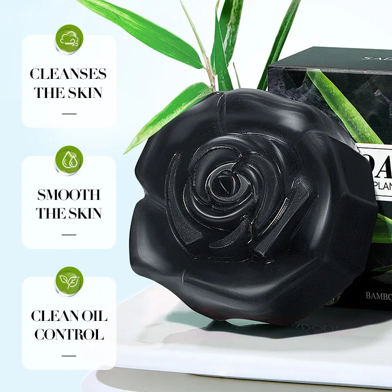 Silcy Skin Bamboo Charcoal Soap bar in a black rose shape with green plant backdrop and box on Tampa Home & Garden Store