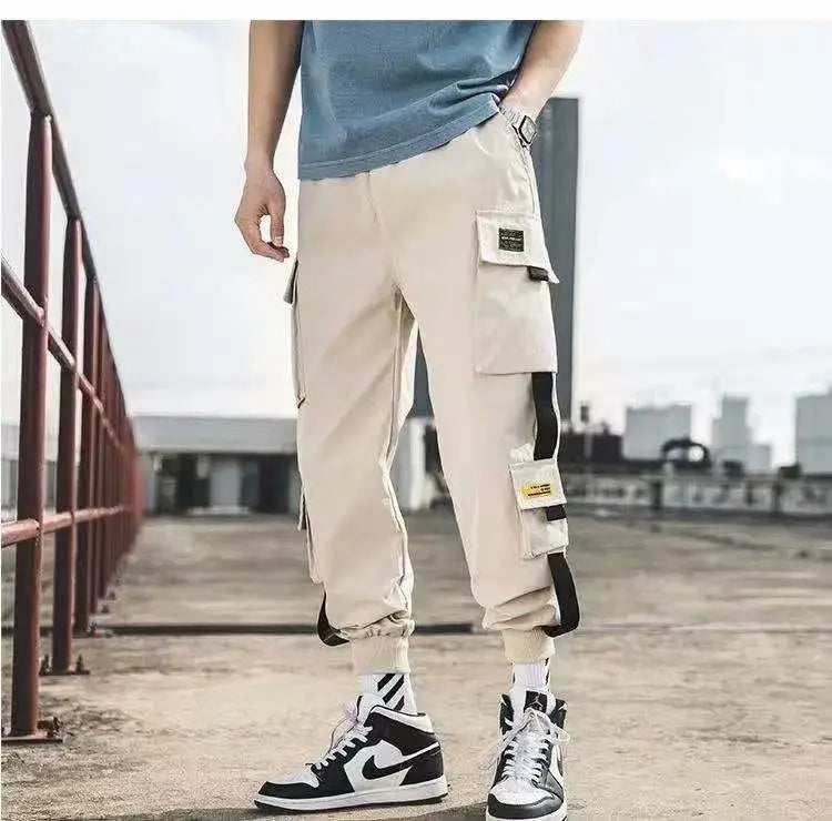Beige men's cargo joggers with cargo pockets and cuffed ankles, streetwear style on Tampa Home & Garden Store