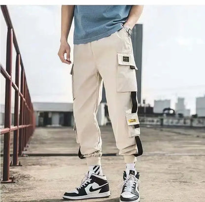 Beige men's cargo joggers with cargo pockets and cuffed ankles, streetwear style on Tampa Home & Garden Store