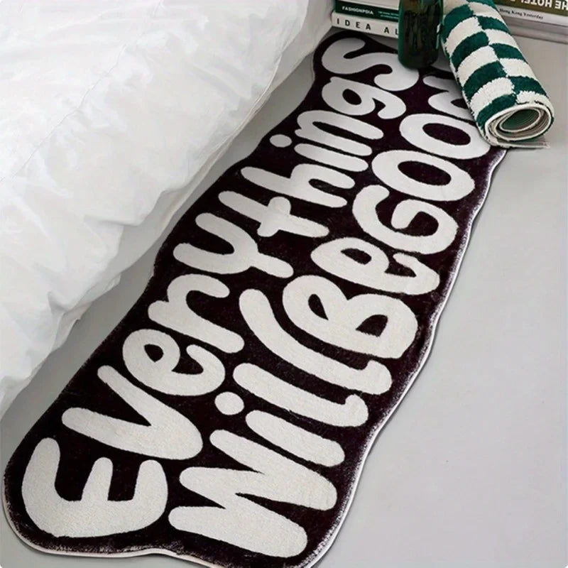 VIKAMA encouragement rug with white script text Everything Will Be Good on dark maroon rug on Tampa Home & Garden Store