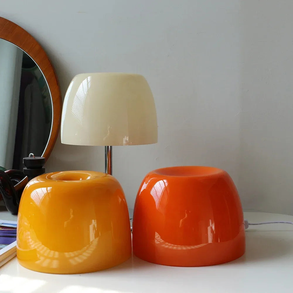 Perfecsy medieval glass table lamps; two glossy yellow and orange bases with a white shade on Tampa Home & Garden Store
