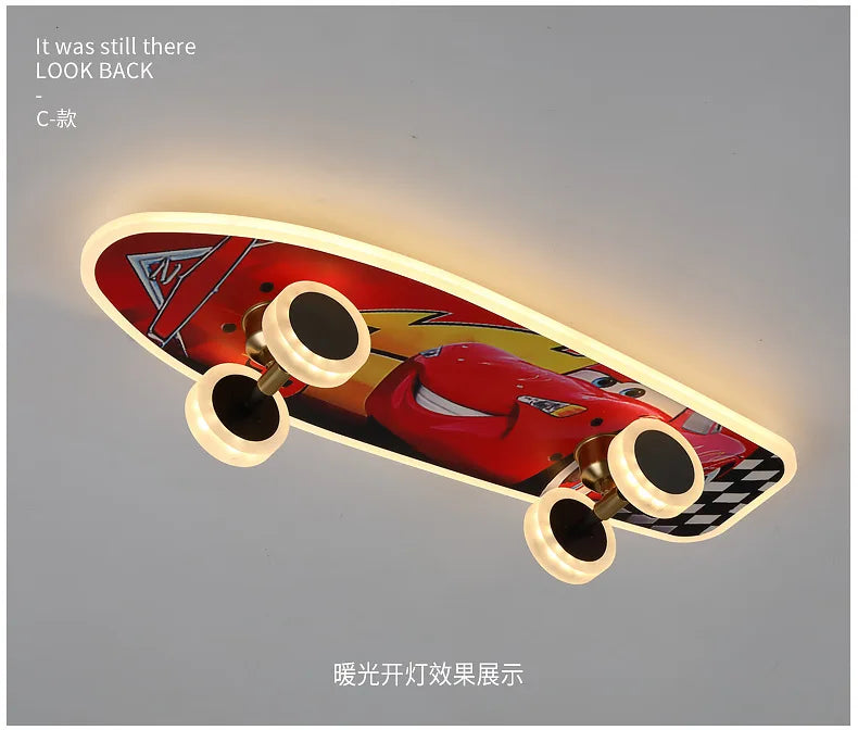 DecorBites™ Kids Skateboard LED Ceiling Light with red car graphic and glowing wheel rings on Tampa Home & Garden Store