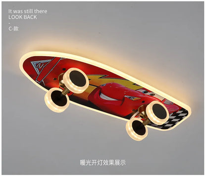 DecorBites™ Kids Skateboard LED Ceiling Light with red car graphic and glowing wheel rings on Tampa Home & Garden Store