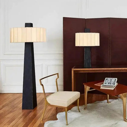 DecorBites LED floor lamps with black angular bases and beige pleated shades in living room on Tampa Home & Garden Store