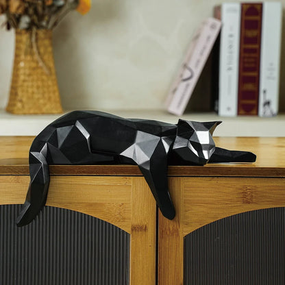 Perfecsy black geometric cat statue lying on a wooden cabinet on Tampa Home & Garden Store