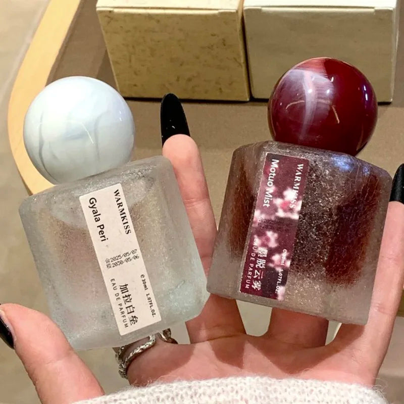 Silcy Skin High-end Rose perfume duo in frosted glass bottles left marble cap, right pink label on Tampa Home & Garden Store