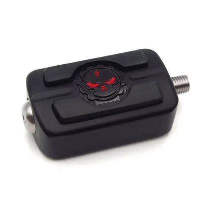 Black motorcycle shifter foot peg with red skull emblem on Tampa Home & Garden Store