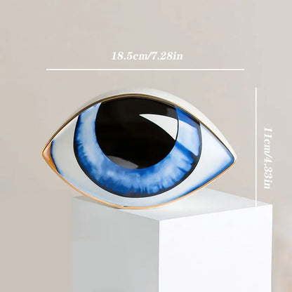 Nordic style ceramic eye sculpture with blue iris and gold rim by Perfecsy on Tampa Home & Garden Store