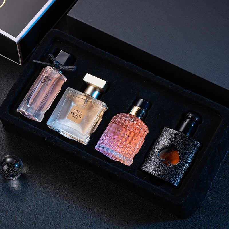 Silcy Skin 4-item perfume gift set with clear square bottle and pink diamond bottle in velvet tray on Tampa Home & Garden Store