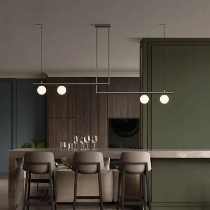 DecorBites Linear Minimalist Chandelier Pendant Light with brass finish and glass globes on Tampa Home & Garden Store