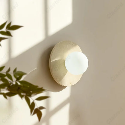Perfecsy LED yellow cave stone round wall lamp with frosted globe, brass finish on Tampa Home & Garden Store