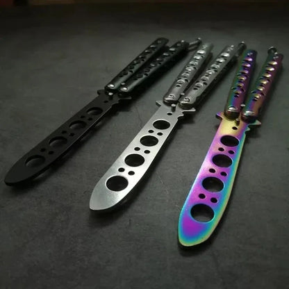 FLIPSTYLEZLLC folding butterfly knife trainer set in black, silver, and rainbow finishes on Tampa Home & Garden Store