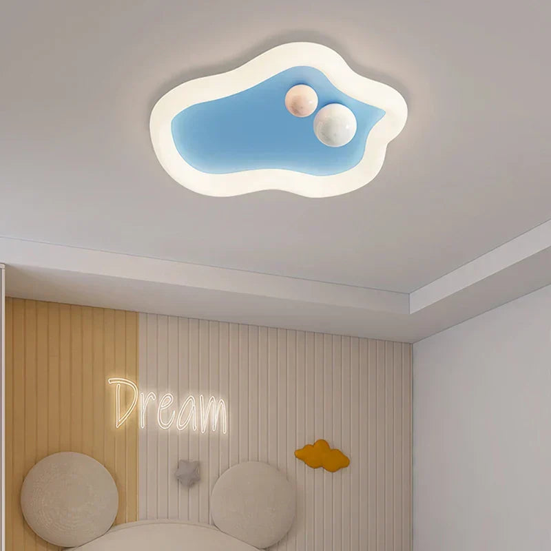 DecorBites cloud ceiling light for kids room with blue interior and two pink spheres on Tampa Home & Garden Store