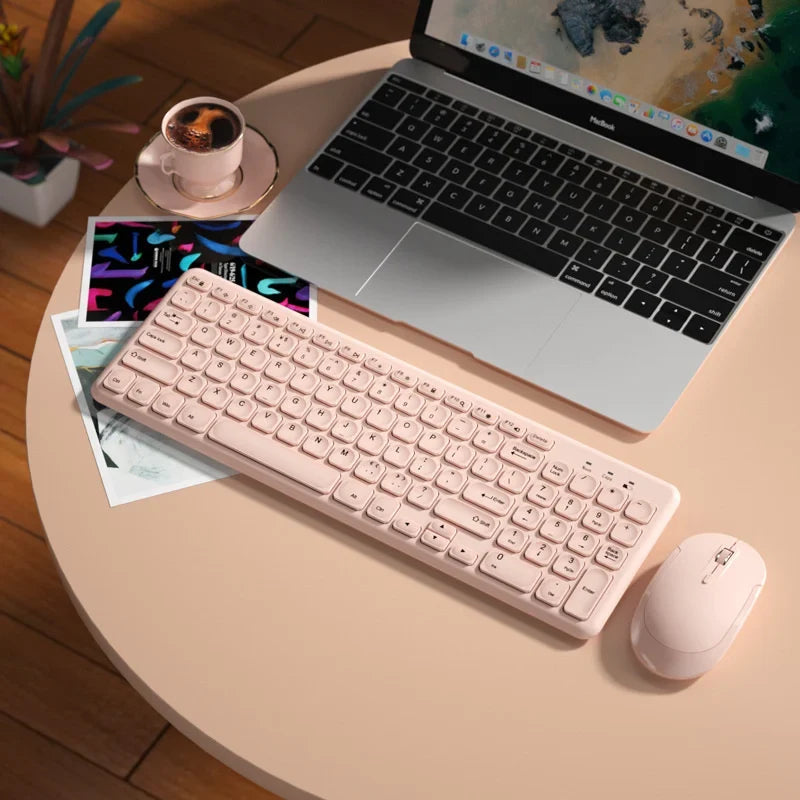 Wireless keyboard and mouse set in pink, ultra-thin design by FLIPSTYLEZLLC on a round table on Tampa Home & Garden Store