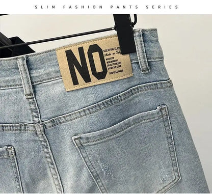 Men skinny jeans in light denim with back pocket and beige leather patch on waistband on Tampa Home & Garden Store