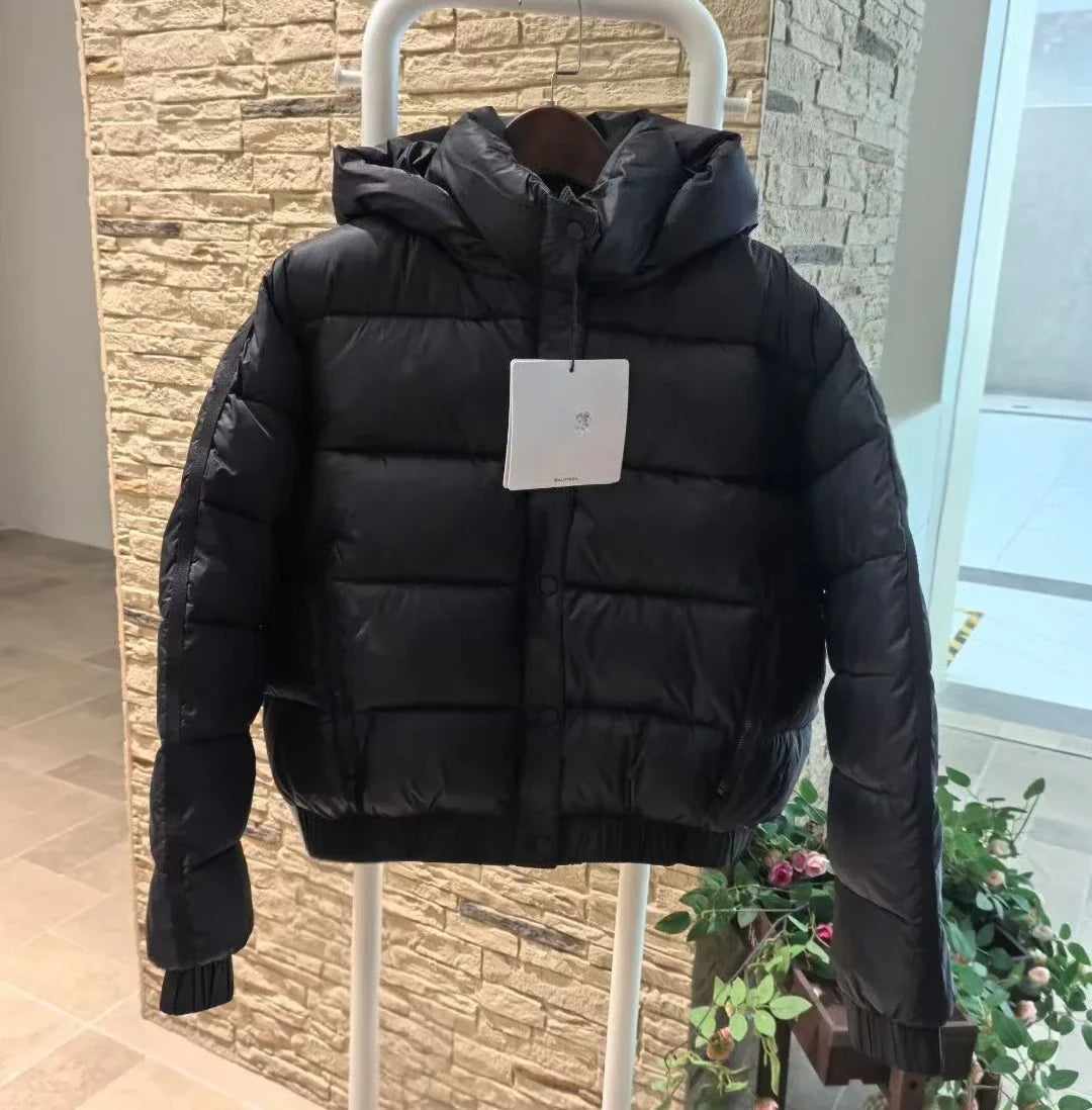 Women's black hooded puffer jacket with thick quilted padding, tag attached by UpTrend Deals on Tampa Home & Garden Store