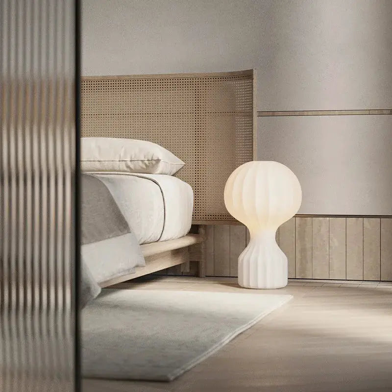DecorBites LED Fabric Floor Lamp with white fabric shade and sculptural white base in bedroom on Tampa Home & Garden Store