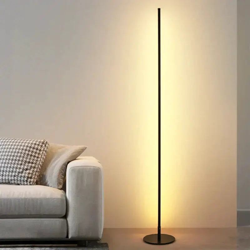 DecorBites LED Floor Lamp 15W aluminum iron black finish with warm glow beside sofa on Tampa Home & Garden Store