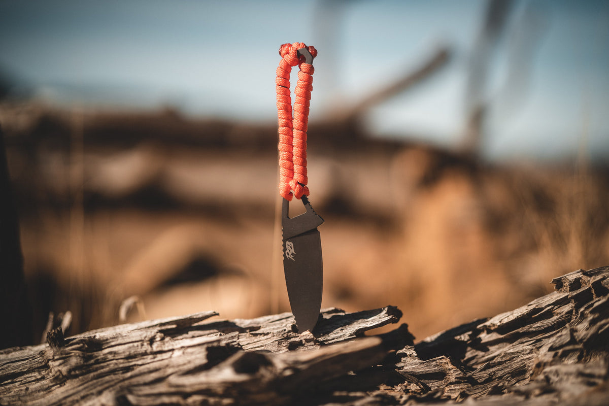 Ultralight Ridge Blade knife with orange paracord wrap by Ridge Belts on Tampa Home & Garden Store