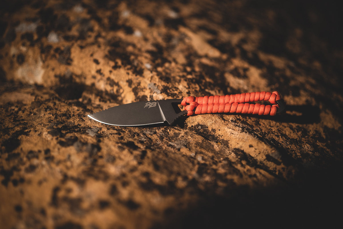 Ultralight Ridge Blade knife with orange paracord handle by Ridge Belts on Tampa Home & Garden Store