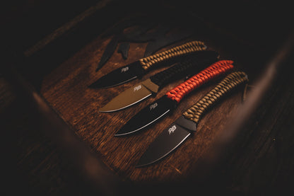 Ultralight Ridge Blade knives by Ridge Belts four with tan, black and red paracord handles on Tampa Home & Garden Store
