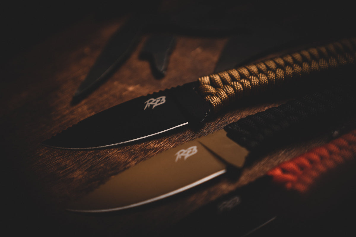 Ultralight Ridge Blade knife by Ridge Belts with black blade and tan paracord handle on Tampa Home & Garden Store