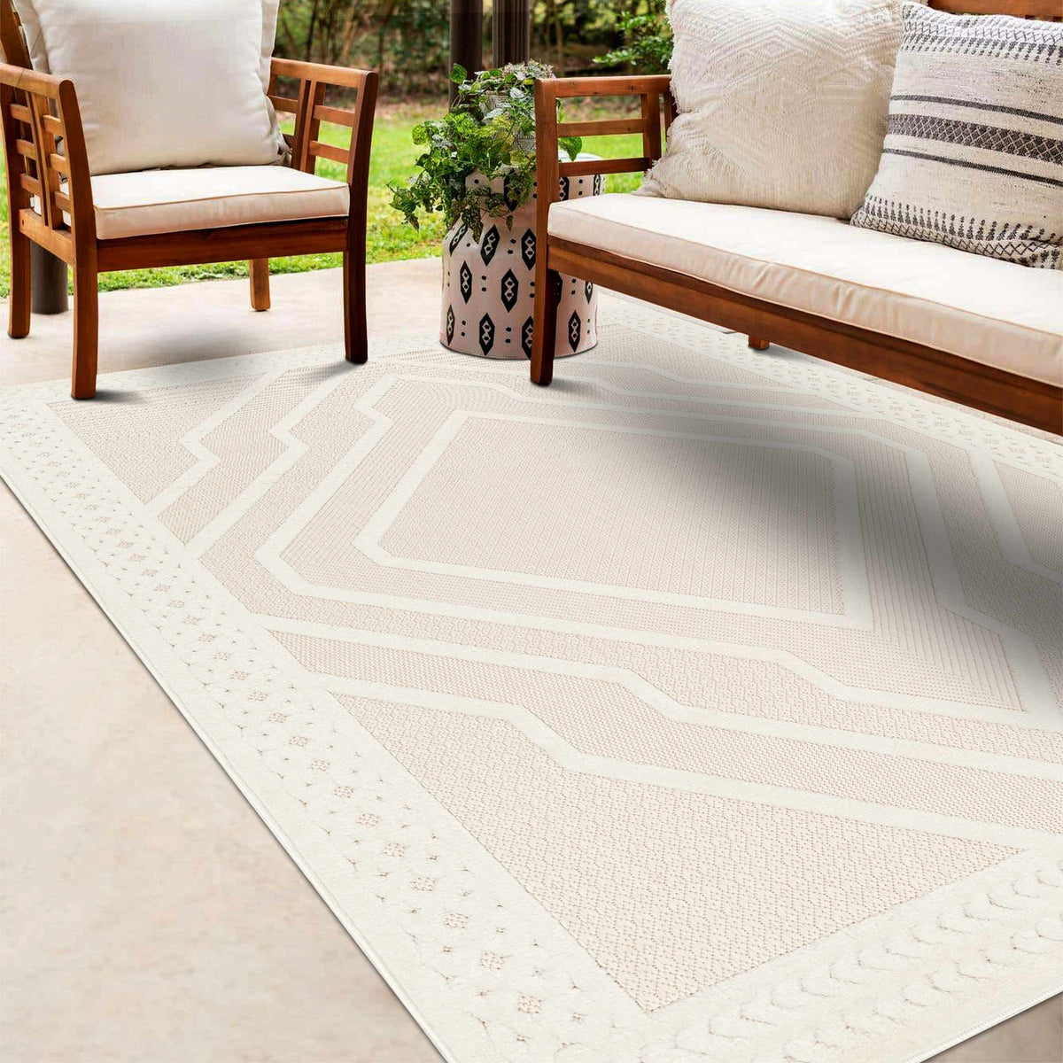 Anja Cream Outdoor Rug by Boutique Rugs, cream woven rug with geometric border for patio on Tampa Home & Garden Store
