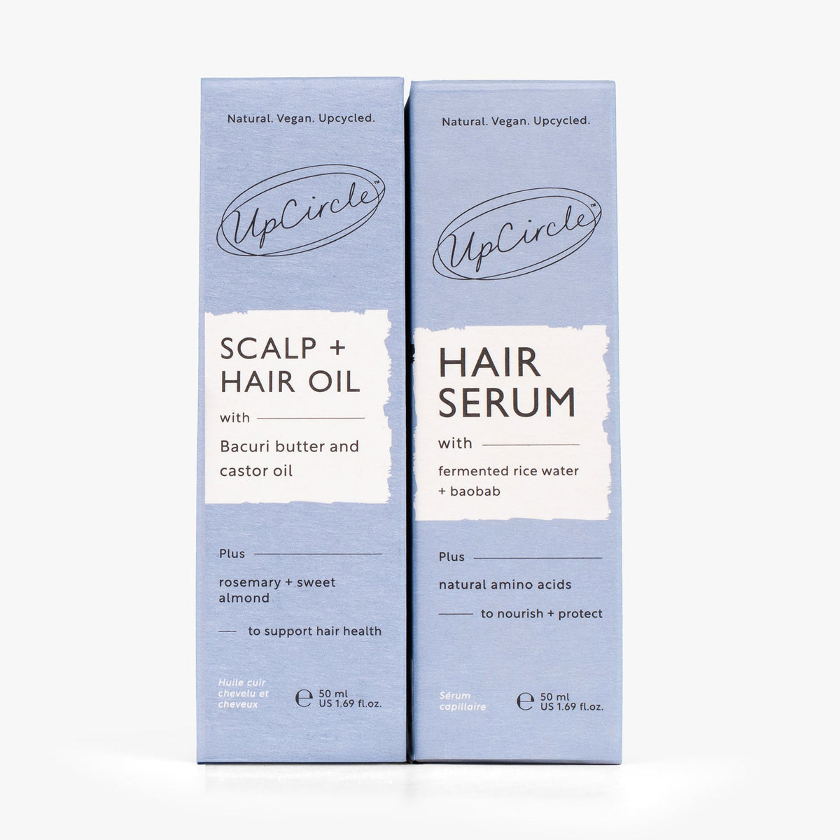UpCircle scalp oil and hair serum duo boxes in blue packaging with UpCircle branding on Tampa Home & Garden Store