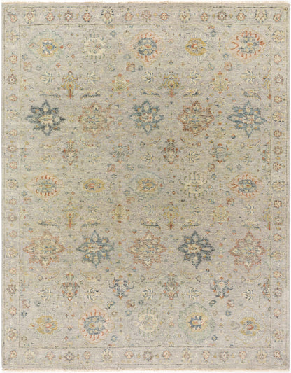 Sipocot Premium Area Rug by Boutique Rugs in muted gray blue with delicate floral motifs on Tampa Home & Garden Store