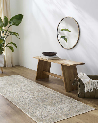 Cara Flat Pile Washable Rug beige by Boutique Rugs on light wood floor with plant and mirror on Tampa Home & Garden Store