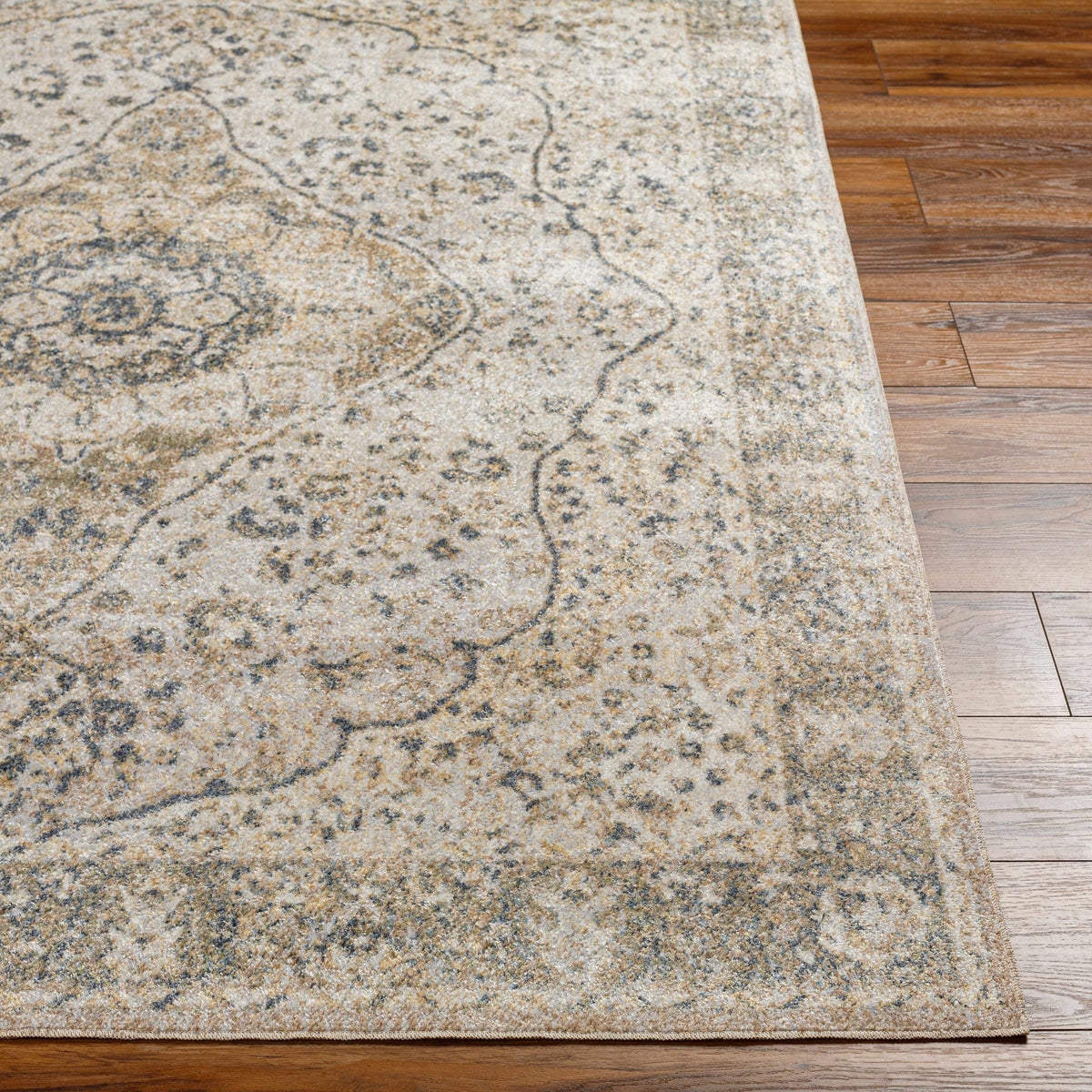 Cara Flat Pile Washable Rug beige gray medallion pattern Boutique Rugs on wood floor on Tampa Home & Garden Store