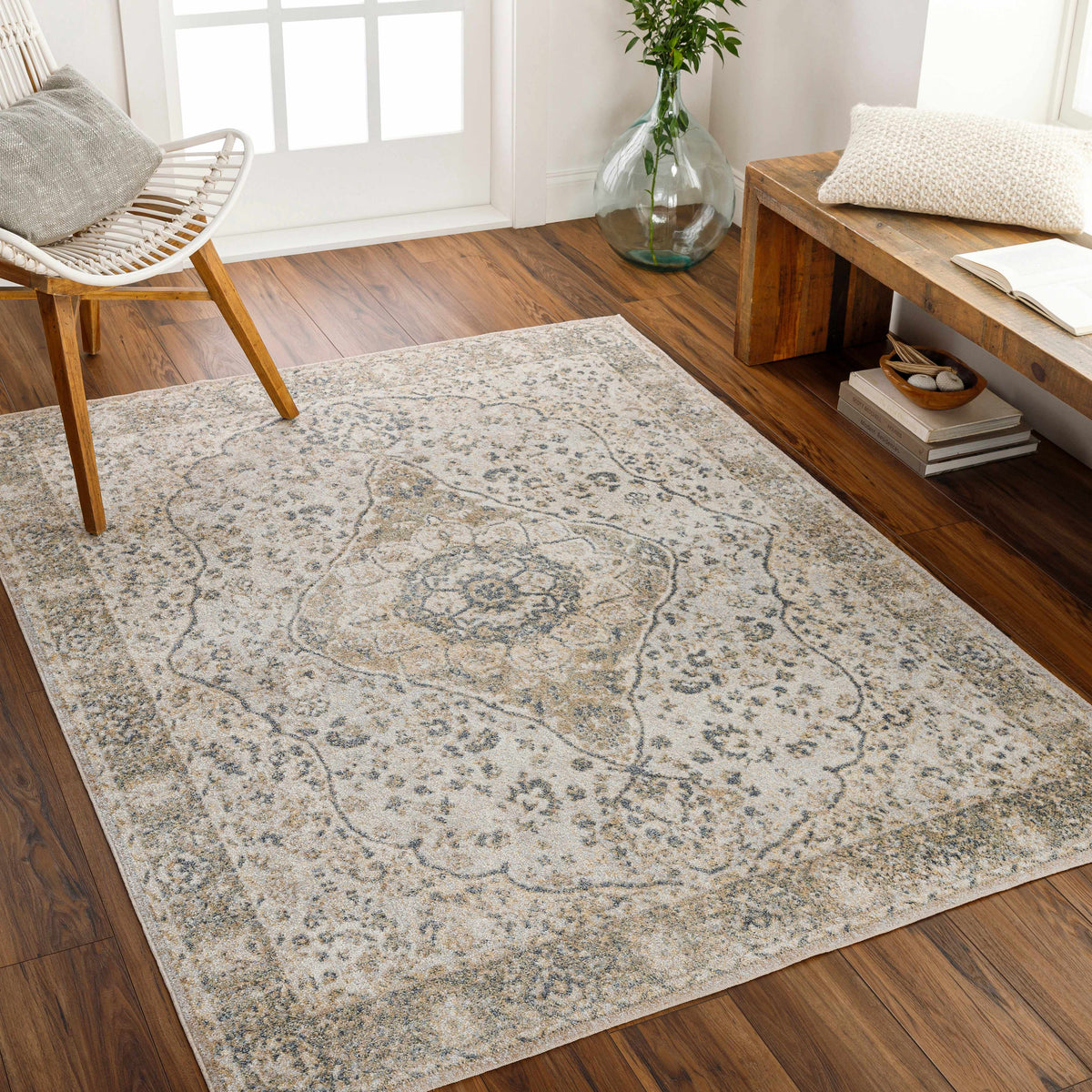 Cara Flat Pile Washable Rug by Boutique Rugs, ivory with blue-gray pattern in a living room on Tampa Home & Garden Store