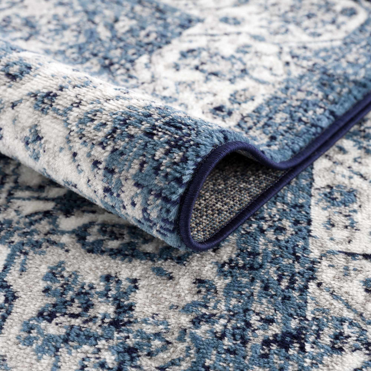Billy Area Rug by Boutique Rugs in blue and white abstract pattern, plush pile, bound edge on Tampa Home & Garden Store