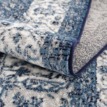 Billy Area Rug by Boutique Rugs in blue and ivory with a distressed pattern and plush pile on Tampa Home & Garden Store