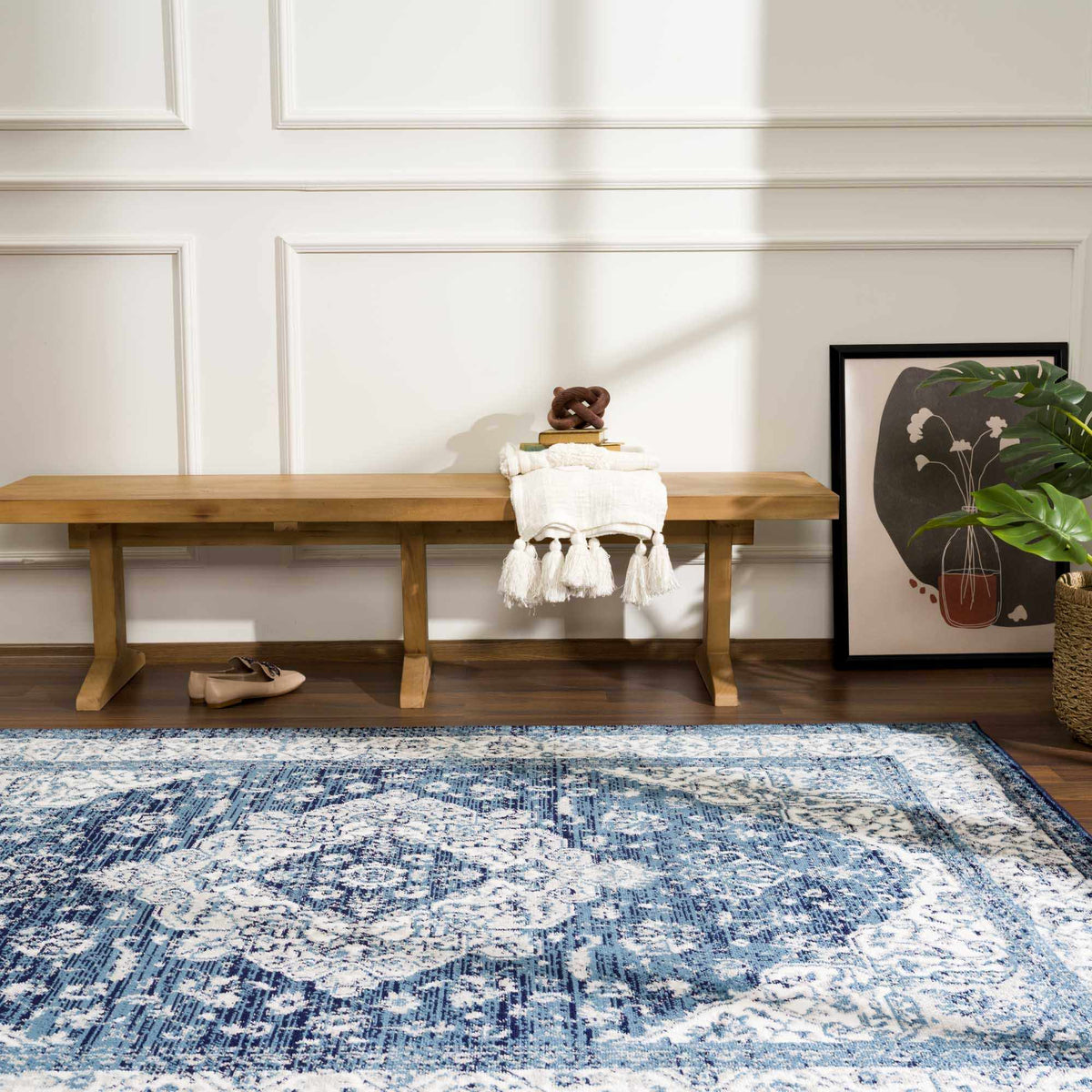 Billy Area Rug by Boutique Rugs, blue abstract pattern on a wooden floor on Tampa Home & Garden Store