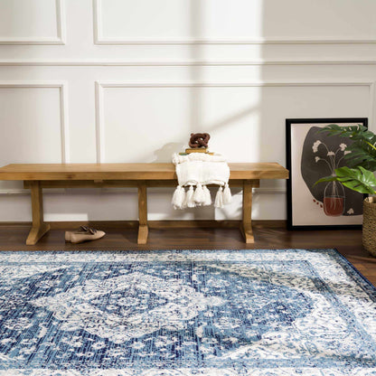 Billy Area Rug by Boutique Rugs, blue abstract pattern on a wooden floor on Tampa Home & Garden Store