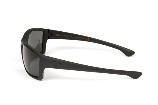 Sunglasses Scout Blackout by Skeleton Optics with matte black frame and orange branding on Tampa Home & Garden Store