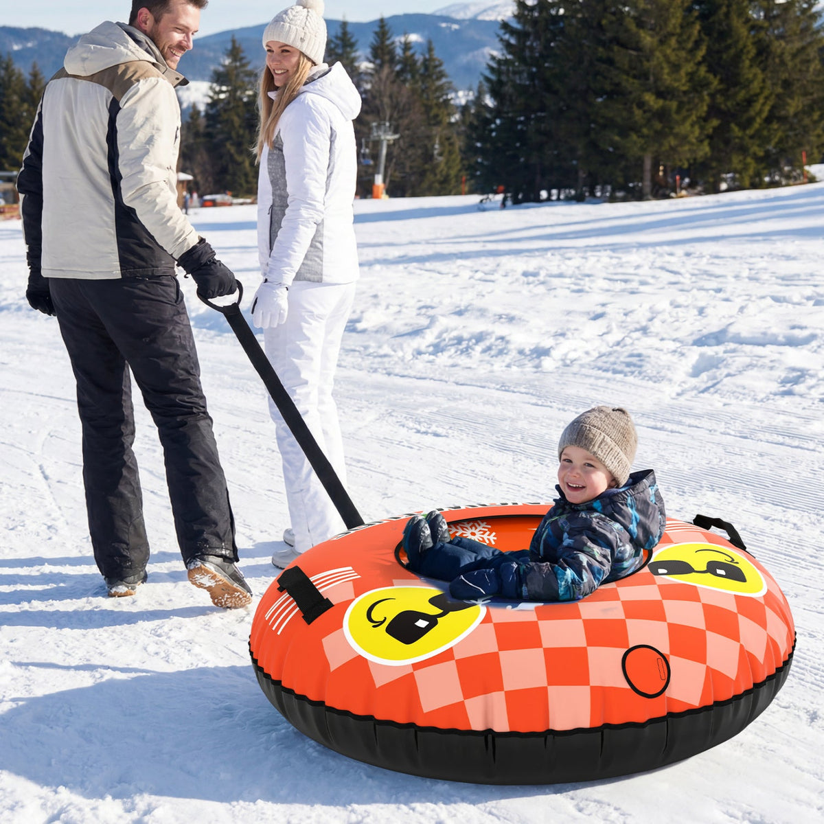 Heavy Duty Inflatable Snow Tube with Tow Strap DirectDeals orange and black tube, kid riding on snow on Tampa Home & Garden Store