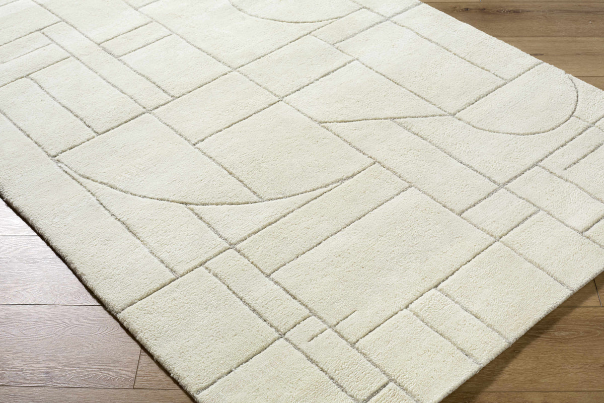 Fusao Off White Area Rug by Boutique Rugs - plush cream rug with geometric block pattern on Tampa Home & Garden Store
