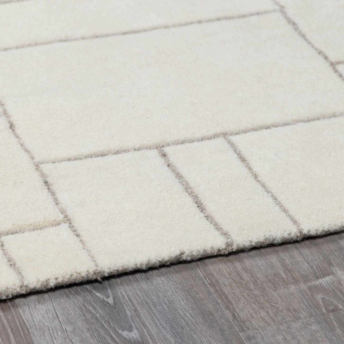 Fusao Off White Area Rug by Boutique Rugs with plush texture and ivory grid pattern on Tampa Home & Garden Store